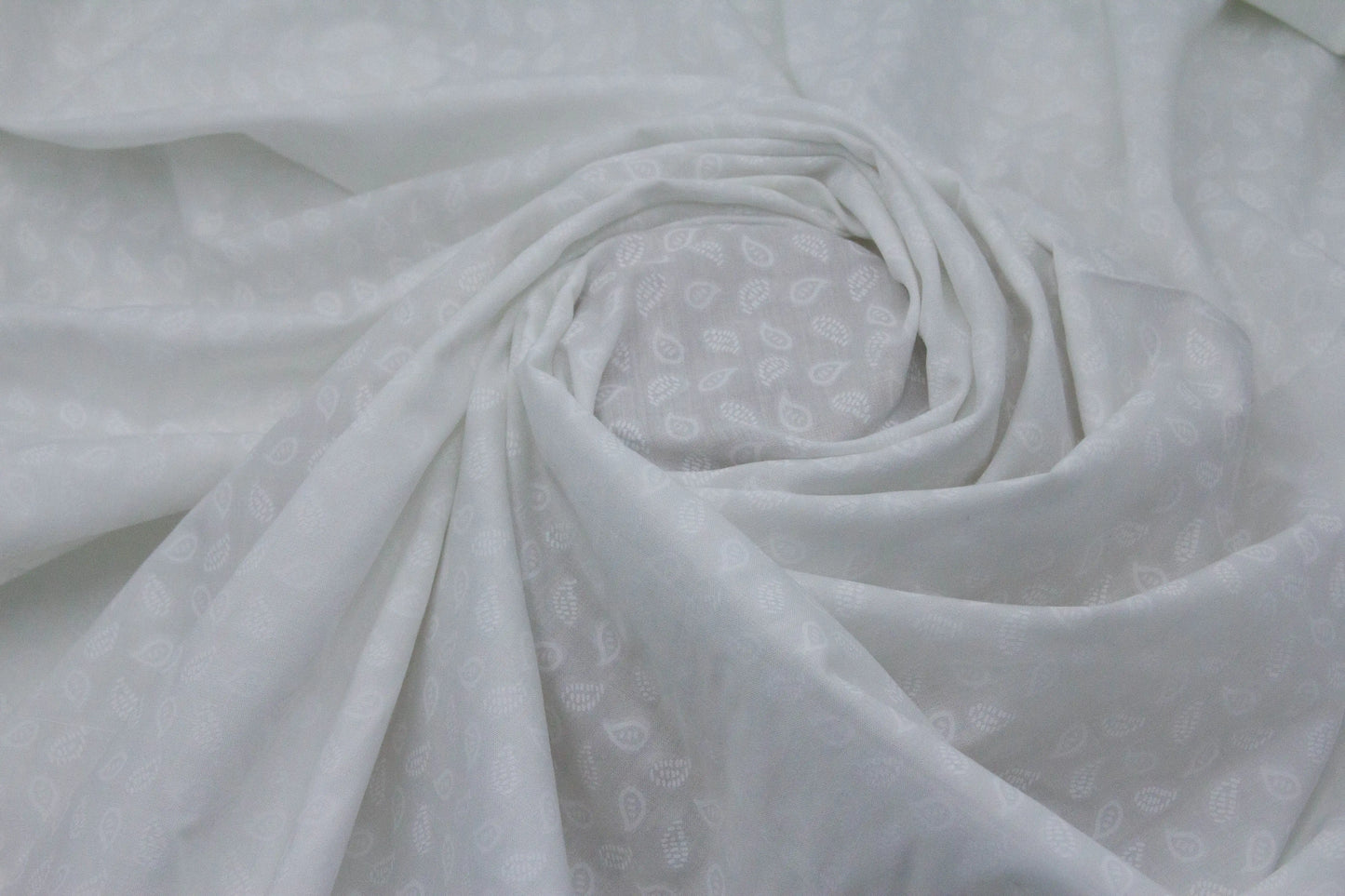 Cotton Self Design Emboss Leaves Fabric