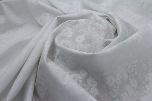 Cotton Self Design Emboss Floral Fabric